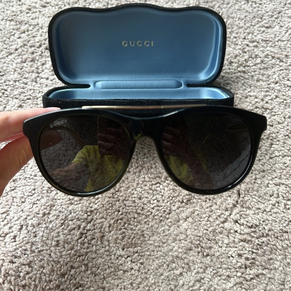 Gucci black and gold sunglasses!
